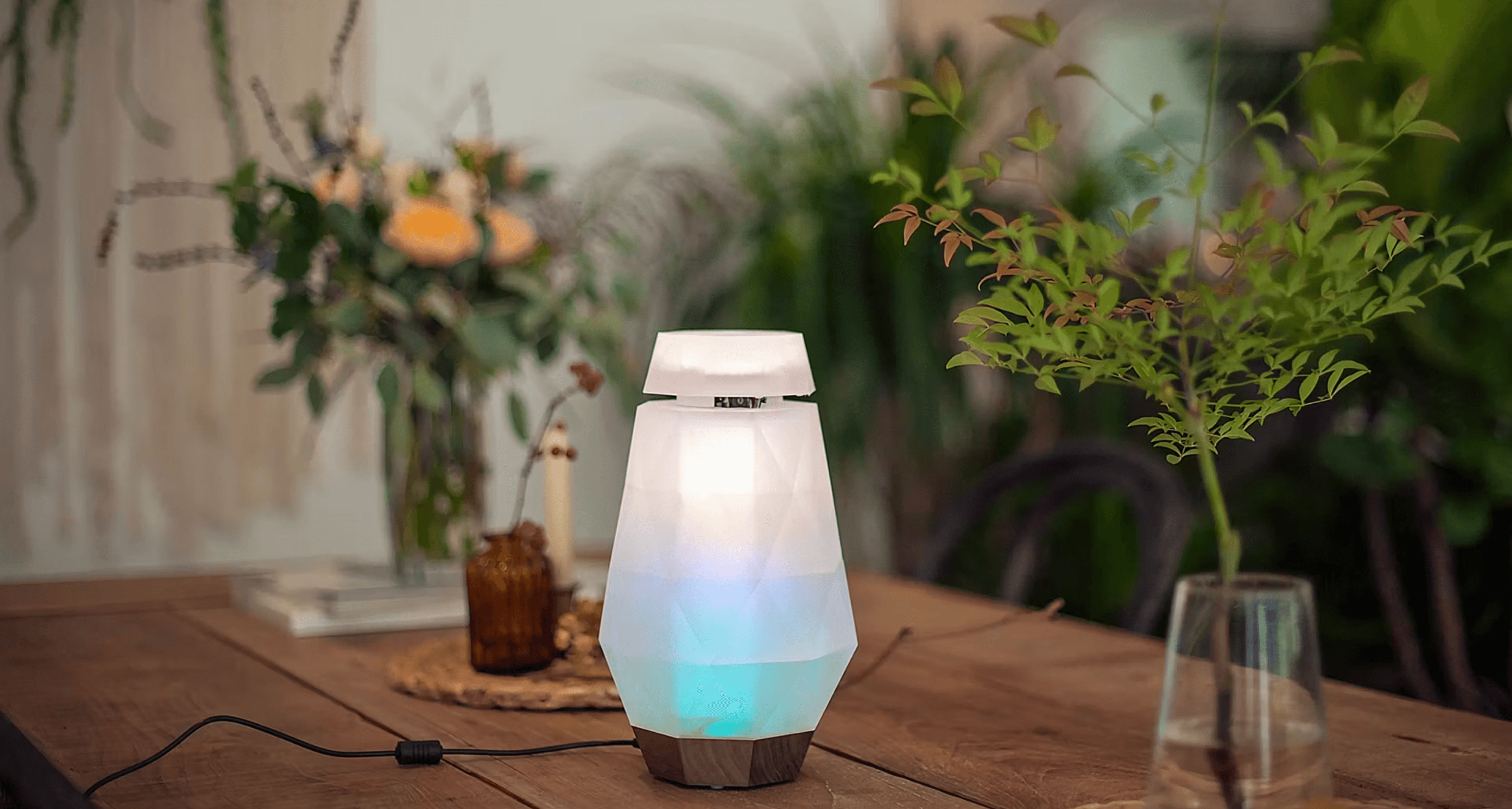 Bringing the Colour Senses of Personal Photos to Everyday Living Environment: The Design and Deployment of a Tangible Interactive Lighting Artifact
